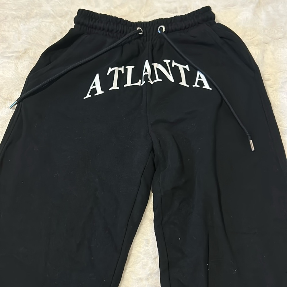 Black Comfortable Sweatpants. ATLANTA written across it.